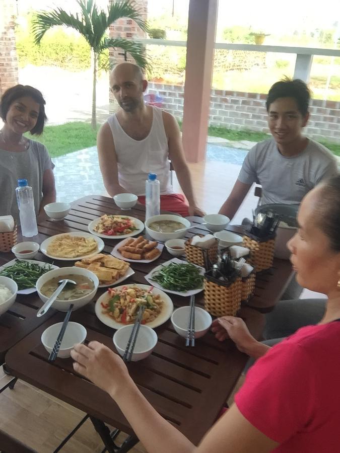 Sunshine Homestay Фонг Нха Екстериор снимка